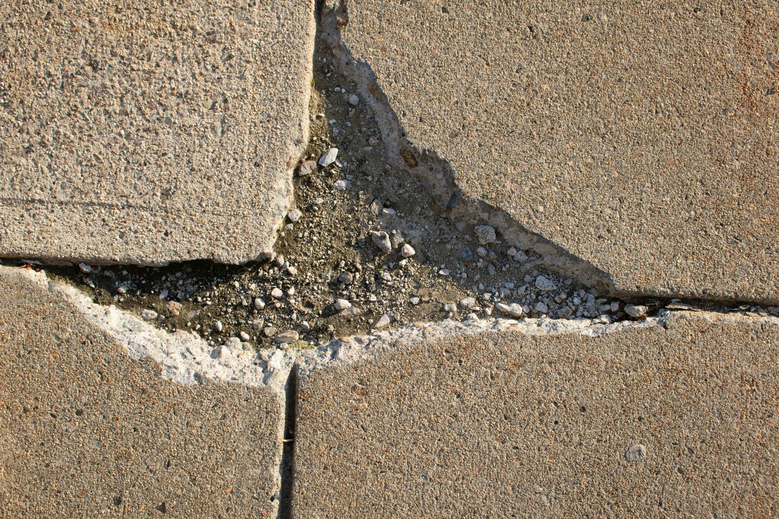 Cracked concrete indicating foundation movement
